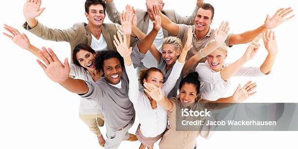 Happy business colleagues with hands raised